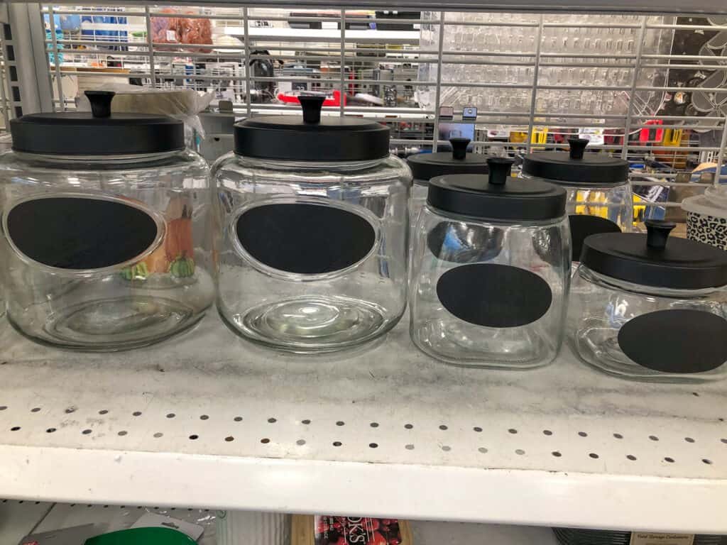 Large, medium, and small jars that will be used to organize the laundry room.